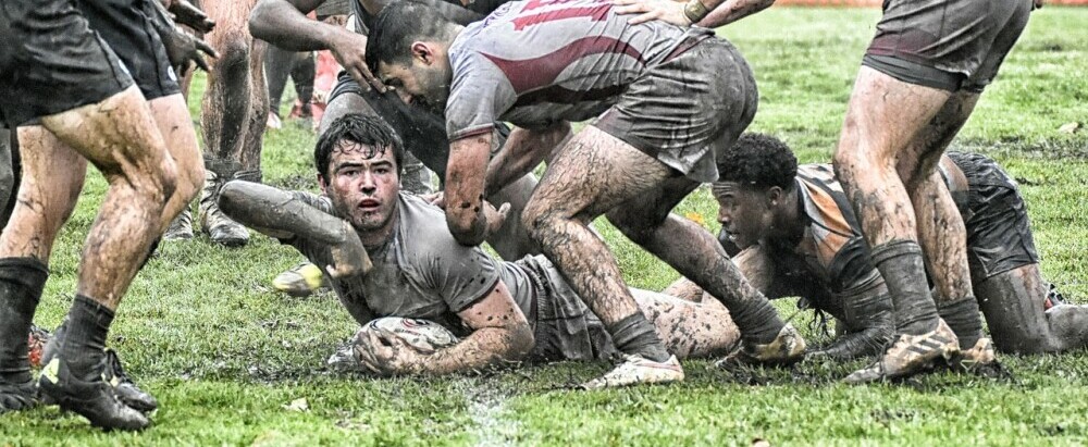 College rugby in the mud and the rain 