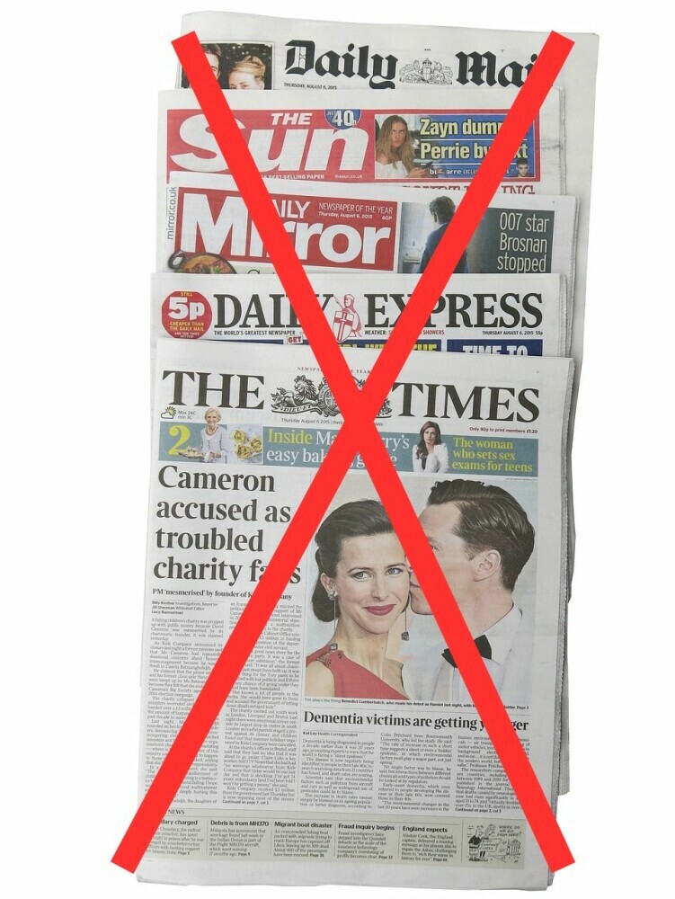 This was the end of my career as a paper boy - image of a stack of British newspapers with a big red cross through them