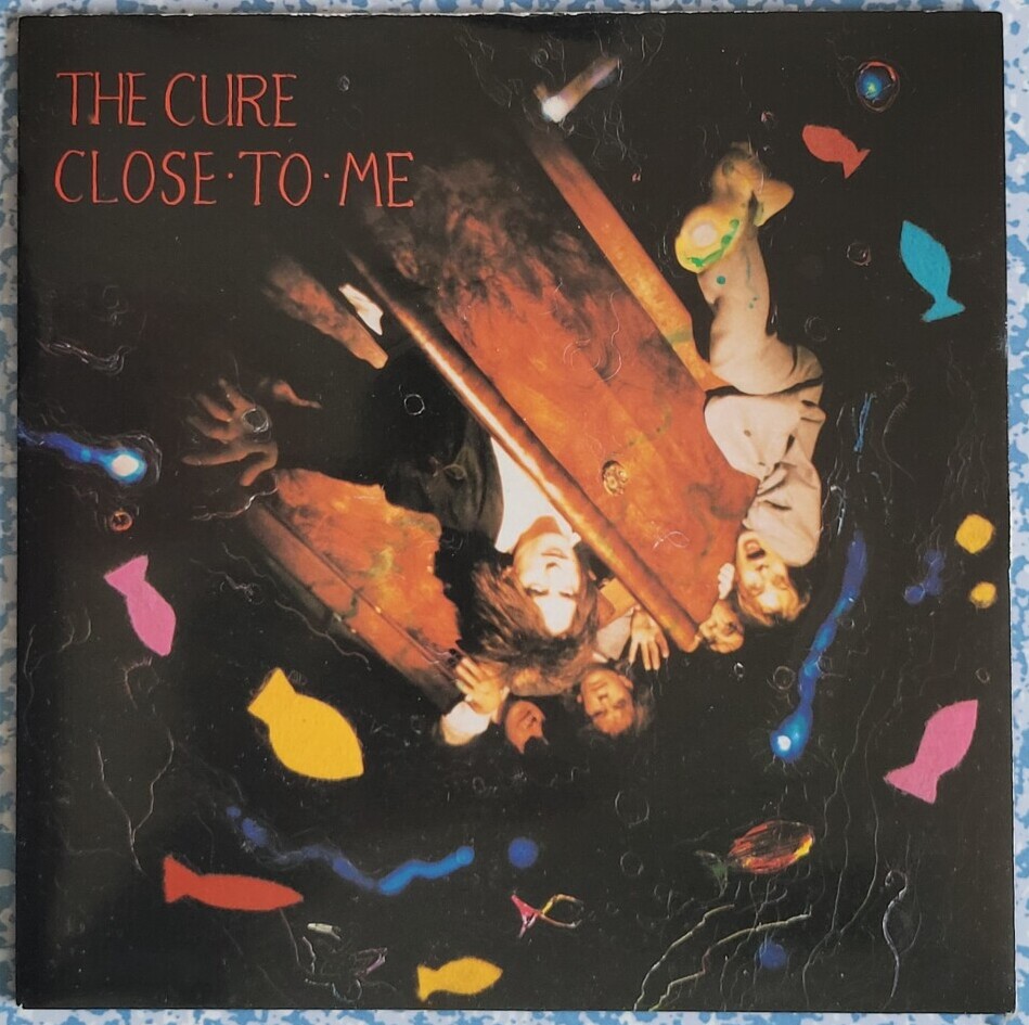 The cover of The Cure's Close To Me. Wardrobe included