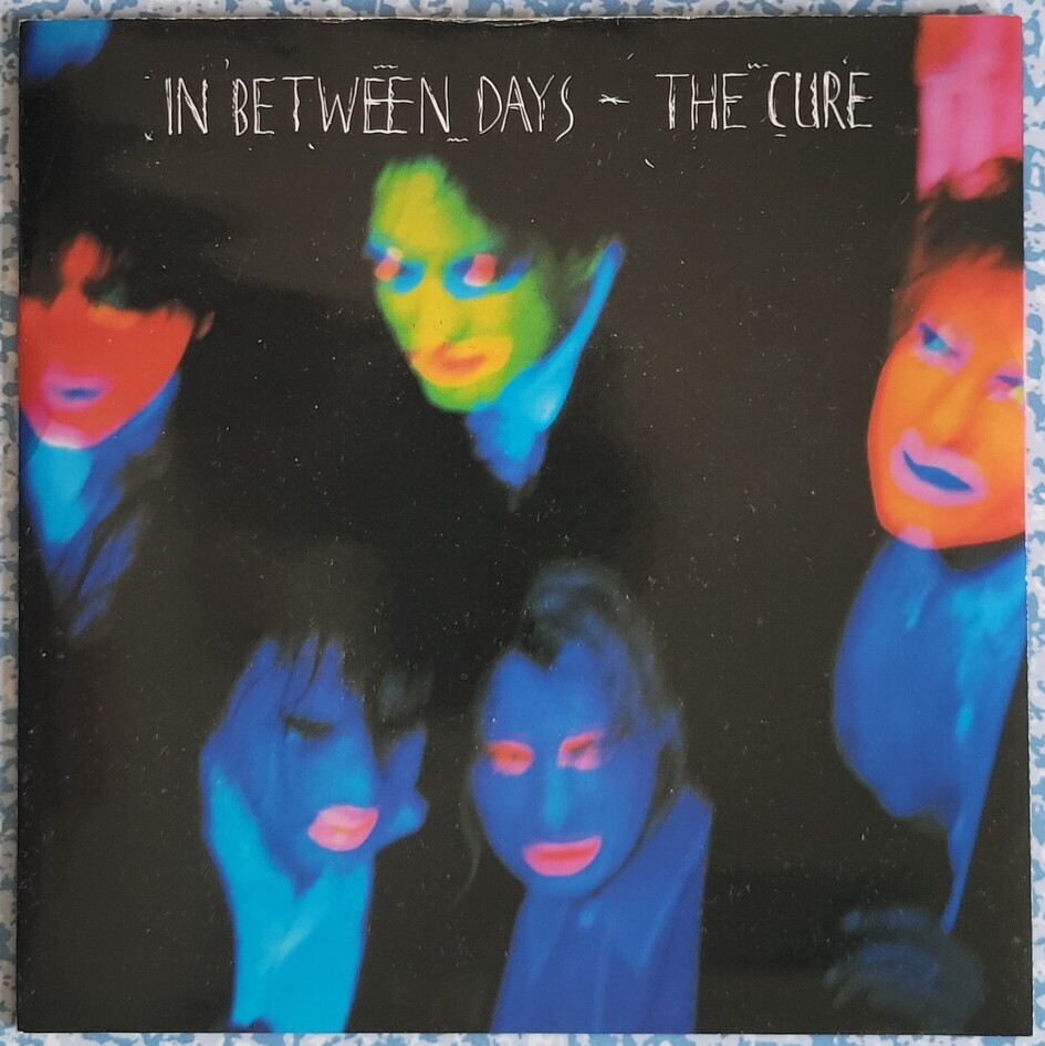 The Cure's In Between Days on the kitchen table
