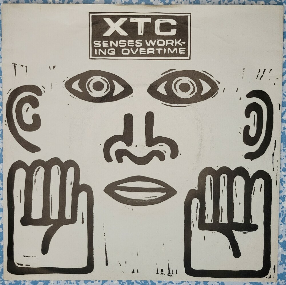The front of the record sleeve for Swindon's finest, XTC and their single, Senses Working Overtime The front of the record sleeve for Swindon's finest, XTC and their single, Senses Working Overtime