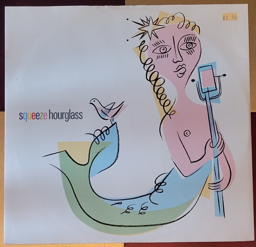 Squeeze - Hourglass on 12-inch. Exactly the same as 7-inch, but with one extra track.Complete with the price I paid - £1.50 - visible in the top right hand corner.